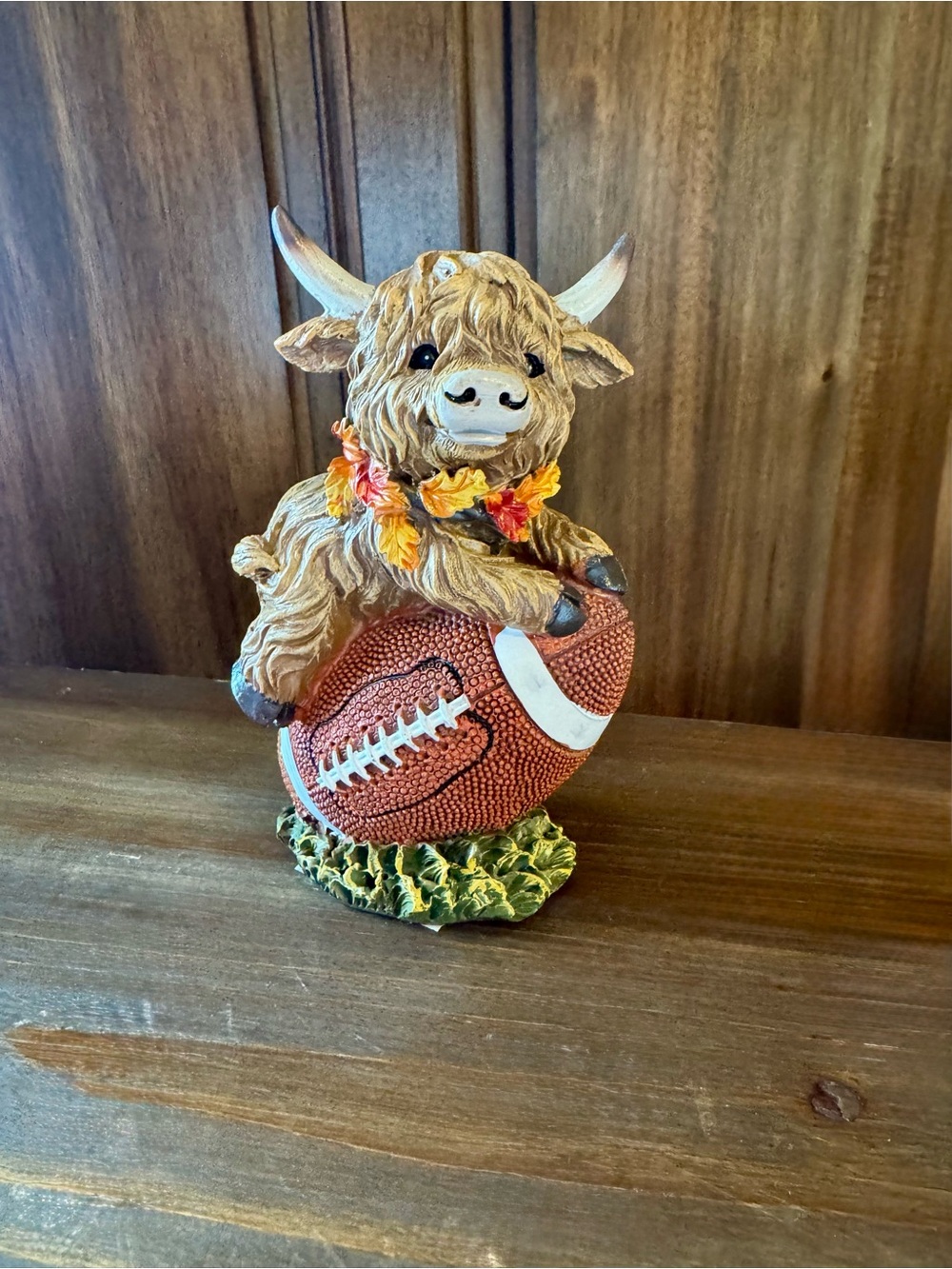 Brown Highland Cow Figurine with Football - Home Accent